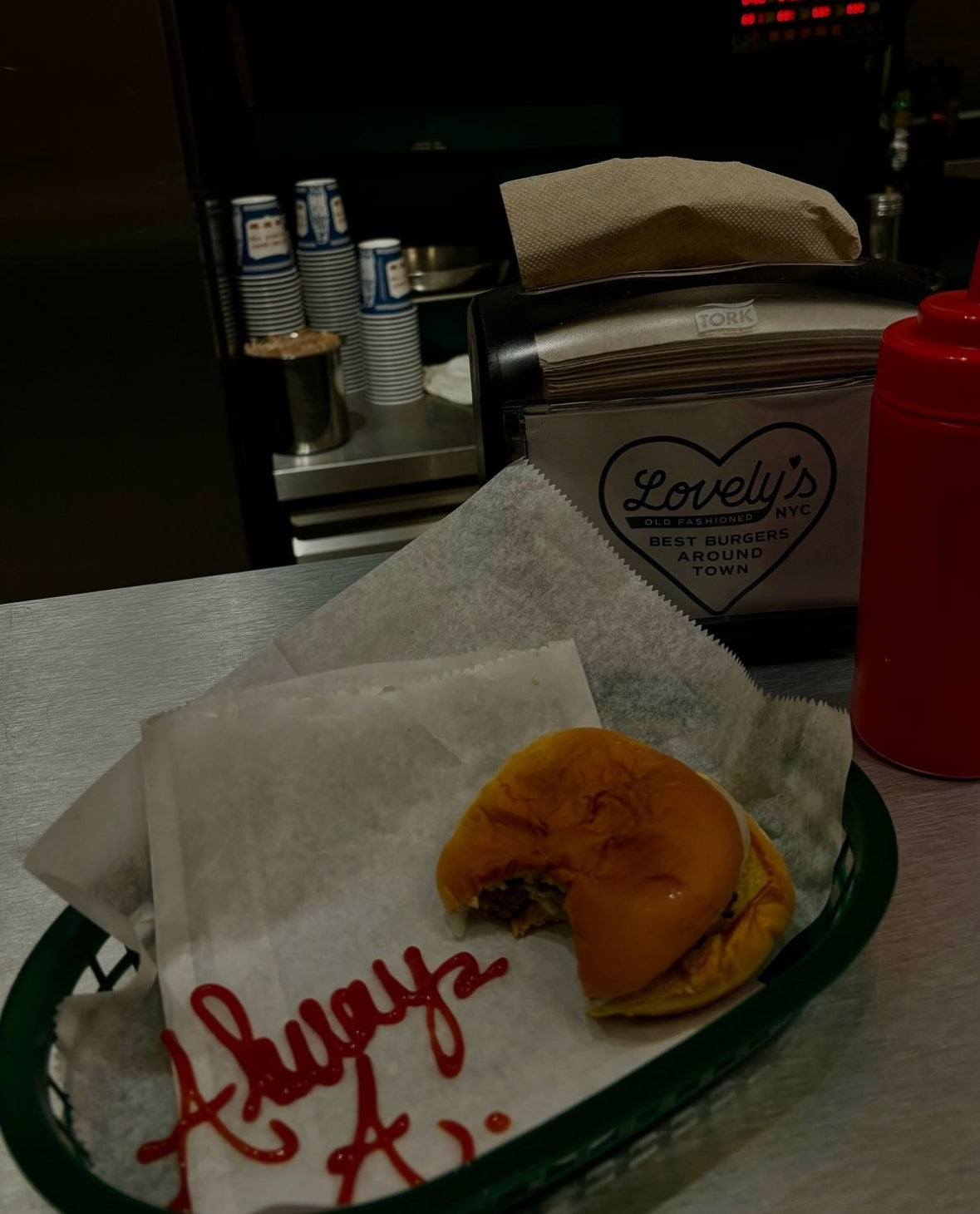 Always, A. fine jewelry ad showing the name spelled out with ketchup next to a chopped cheese