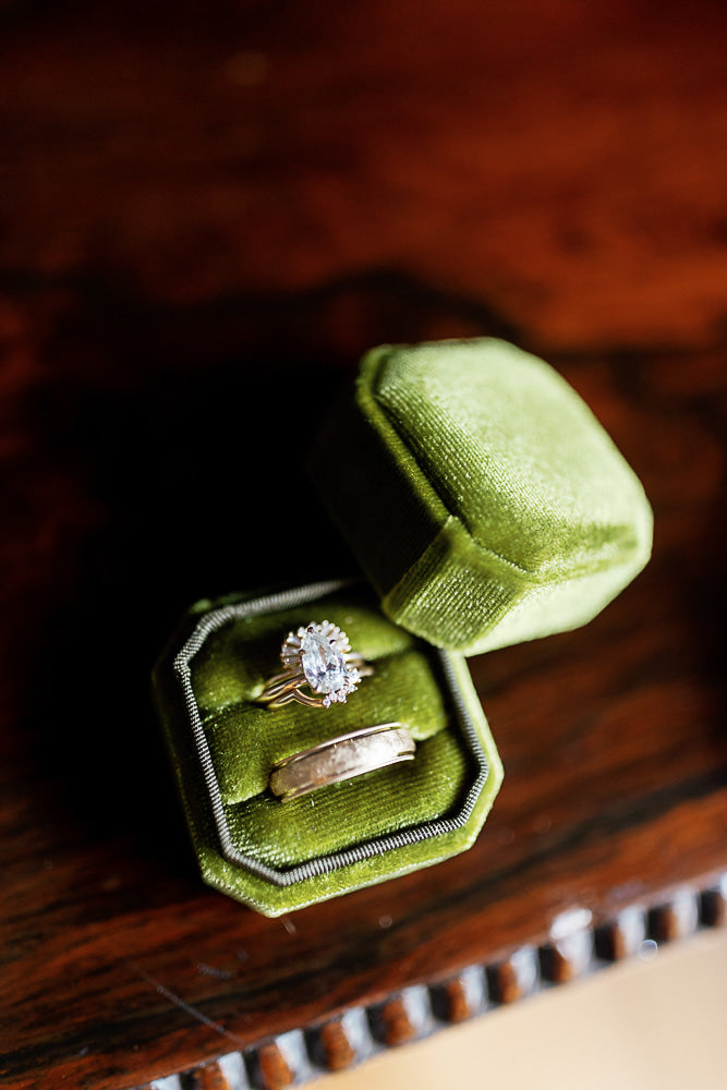 Always, A. fine jewelry ad showcasing a bespoke diamond and gold wedding set in a luxurious green velvet box